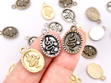 Cargar imagen en el visor de la galería, 10x16mm Pewter Oval Snake Charm with Crystal | Available in Bronze, Matte Gold, Antique Silver