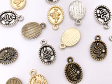 Cargar imagen en el visor de la galería, 10x16mm Pewter Oval Snake Charm with Crystal | Available in Bronze, Matte Gold, Antique Silver