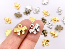 Load image into Gallery viewer, 13x11mm Pewter Cute Tiny Bow Tie Charm in Gold, Silver and Brass 125g