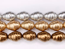 Cargar imagen en el visor de la galería, 17x22mm Shell Pearl Bee Hive Shape Beads Textured Egg Shape Beads Around 16" Silver, Champagne, Brown Color (1 Strand)