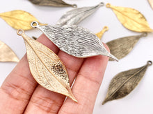 Load image into Gallery viewer, 16x49mm Pewter Carved Wavy Thin Leaf Pendants Bulk Order in Gold, Rosy Gold, Silver, Brass 125g