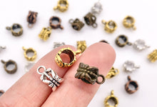 Cargar imagen en el visor de la galería, 6x8mm Pewter Charm Holder Spacers Butterfly Carved Spacers with Loop in Gold, Silver, Bronze and Copper 125G