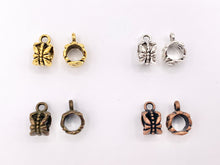 Cargar imagen en el visor de la galería, 6x8mm Pewter Charm Holder Spacers Butterfly Carved Spacers with Loop in Gold, Silver, Bronze and Copper 125G