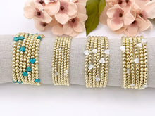 Cargar imagen en el visor de la galería, 18K Gold Plated Hematite Magnesite/ Howlite/ Shell Dainty Stretchy Bracelet 1 piece