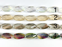 Load image into Gallery viewer, 15x30mm Twisted Oval Shiny Faceted Crystal Skinny Long Oval Dyed Glass Beads 4 Colors Available Around 11"