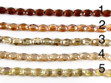 Load image into Gallery viewer, Faceted Shiny 12x16mm Dyed Glass Oval Crystal Strands