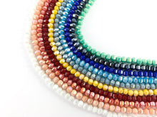 Load image into Gallery viewer, Faceted 36 Cut Shiny 5-6mm Dyed Jade Glass Pumpkin Shape Rondelle Crystal Strands