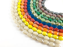 Load image into Gallery viewer, Faceted Shiny 12x16mm Dyed Jade Glass Oval Crystal Strands
