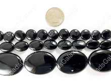 Load image into Gallery viewer, Grade AAA Solid Black Onyx Fine Cut Coin Oval Shiny Natural Gemstone Beads High Quality Healing Stone Around 15" 1 strand