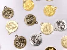 Load image into Gallery viewer, 16mm Pewter Evil Eye Carved Circle Pendants Curved Coin One Sided Charms Bulk Order in Gold, Matte Gold, Silver, Brass
