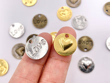 Load image into Gallery viewer, 14mm Pewter Double Sided Heart LOVE Coin Charms Valentine&#39;s Day Heart Pendants in Gold, Silver, Bronze
