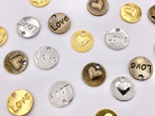 Cargar imagen en el visor de la galería, 14mm Pewter Double Sided Heart LOVE Coin Charms Valentine&#39;s Day Heart Pendants in Gold, Silver, Bronze
