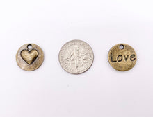 Load image into Gallery viewer, 14mm Pewter Double Sided Heart LOVE Coin Charms Valentine&#39;s Day Heart Pendants in Gold, Silver, Bronze
