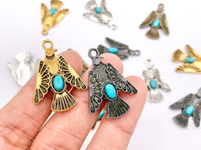 Cargar imagen en el visor de la galería, 20x28mm Pewter Thunderbird Pendants with Turquoise Howlite in Gold, Silver Gunmetal and Bronze Color
