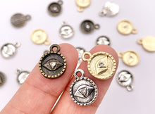 Cargar imagen en el visor de la galería, 10mm Pewter Evil Eye Crystal Circle Pendants Cute Coin One Sided Charms in Matte Gold, Silver, Brass
