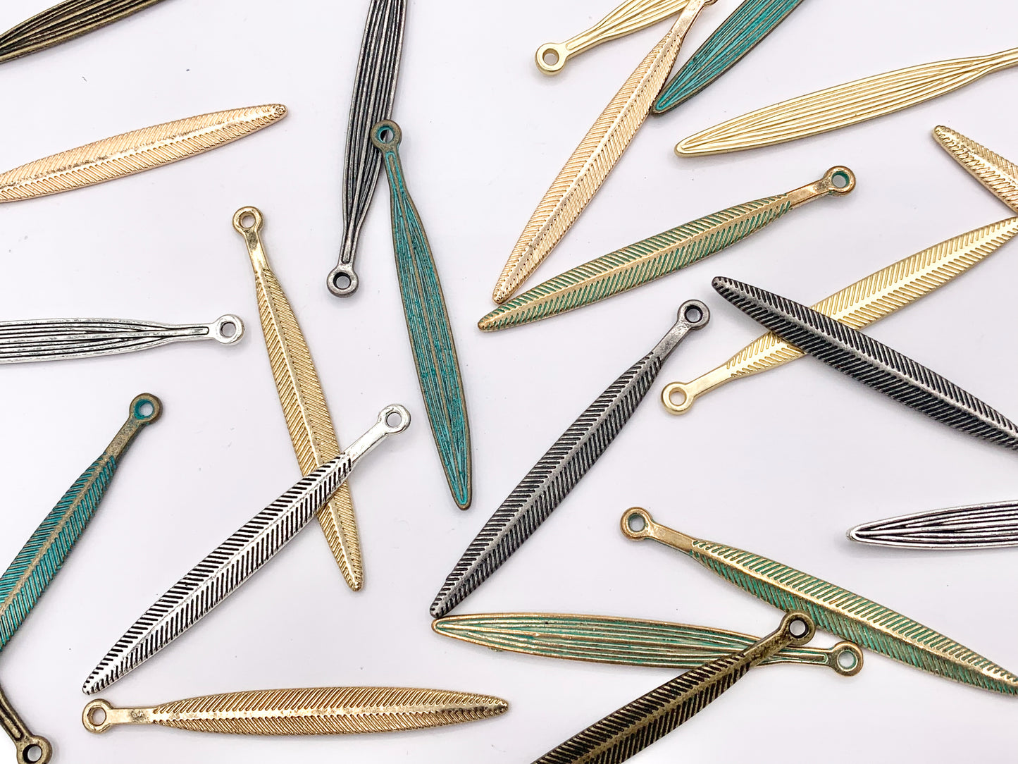 5x51mm Pewter Carved Skinny Leaf Pendants Bulk Order in Gold, Matte Gold, Silver, Brass, Gunmetal, Blue And Green Patina