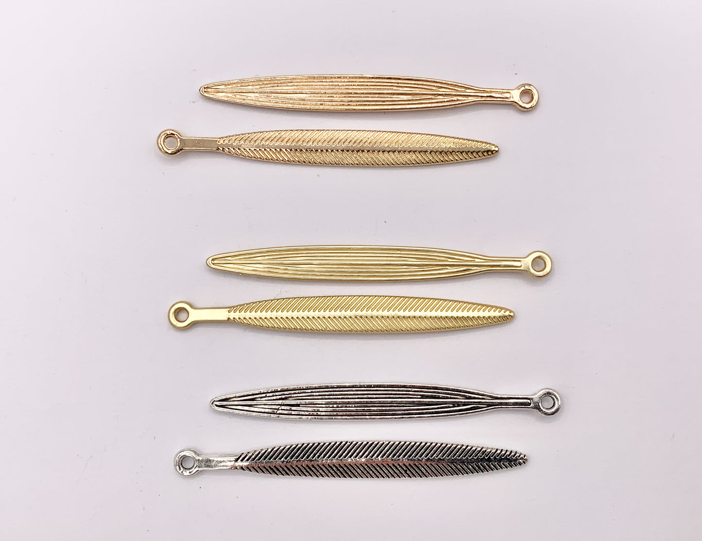 5x51mm Pewter Carved Skinny Leaf Pendants Bulk Order in Gold, Matte Gold, Silver, Brass, Gunmetal, Blue And Green Patina