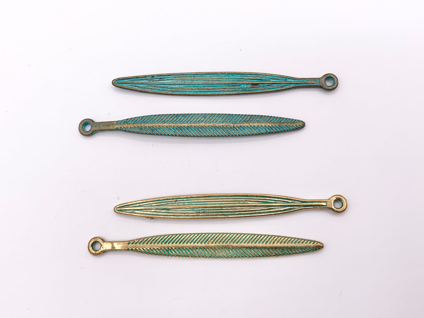 5x51mm Pewter Carved Skinny Leaf Pendants Bulk Order in Gold, Matte Gold, Silver, Brass, Gunmetal, Blue And Green Patina