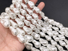 Load image into Gallery viewer, White Shell Pearl Baroque Beads Around 15-16&quot; Available in 2 Sizes (1 Strand)
