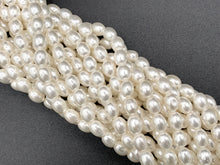 Load image into Gallery viewer, White Shell Pearl Smooth Rice Beads Pearl Powder Coated Shell Beads Around 15&quot; Available in 6 Sizes (1 Strand)
