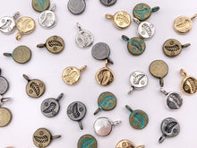 Load image into Gallery viewer, 10mm Pewter Small Leaf Coin Charms in Gold, Silver, Bronze, Gunmetal &amp; Blue Patina
