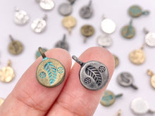 Load image into Gallery viewer, 10mm Pewter Small Leaf Coin Charms in Gold, Silver, Bronze, Gunmetal &amp; Blue Patina
