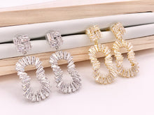 Load image into Gallery viewer, Wavy Oval Luxury Baguette CZ Pave Earrings in 18k Gold and Silver Over Copper 2 Pairs
