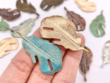 Load image into Gallery viewer, 22x43mm Pewter Curved Leaf Pendants Bulk Order in Rosy Gold, Silver, Brass, Copper and Patina
