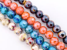 Load image into Gallery viewer, 14mm Electroplated Ceramic Porcelain Large Hole Round Shiny Glossy Beads For Jewelry Making In Tortoise, Orange, Blue &amp; Cream Around 11-12&quot;
