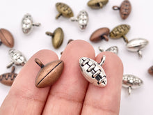 Load image into Gallery viewer, 11x13mm Pewter Puffy Tiny Football Charms Small Curved Sports Charms Bulk Order in  Silver, Copper and Brass 125G
