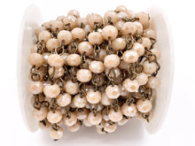 Load image into Gallery viewer, Peach/Beige Crystal Rondelle Faceted Rosary Beaded Chain With Brass Wire By Spool 6mm 8mm
