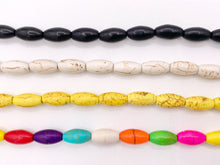 Cargar imagen en el visor de la galería, 6.5x12mm Howlite Rice Shape Beads White, Red, Turquoise, Multicolor, Green, Red, Dark Blue, Purple And More Around 15" Price 1 Strand
