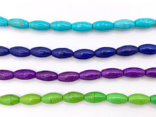 Cargar imagen en el visor de la galería, 6.5x12mm Howlite Rice Shape Beads White, Red, Turquoise, Multicolor, Green, Red, Dark Blue, Purple And More Around 15" Price 1 Strand
