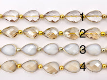 Cargar imagen en el visor de la galería, 13x18mm Gold Trimmed Faceted Shiny Dyed Glass Teardrop Crystal Strands Around 8&quot;
