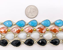 Cargar imagen en el visor de la galería, 13x18mm Gold Trimmed Faceted Shiny Dyed Glass Teardrop Crystal Strands Around 8&quot;
