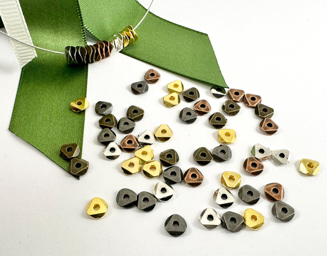 Cuentas espaciadoras onduladas lisas brillantes de peltre de 6 mm en oro, plata, bronce antiguo, cobre antiguo y bronce