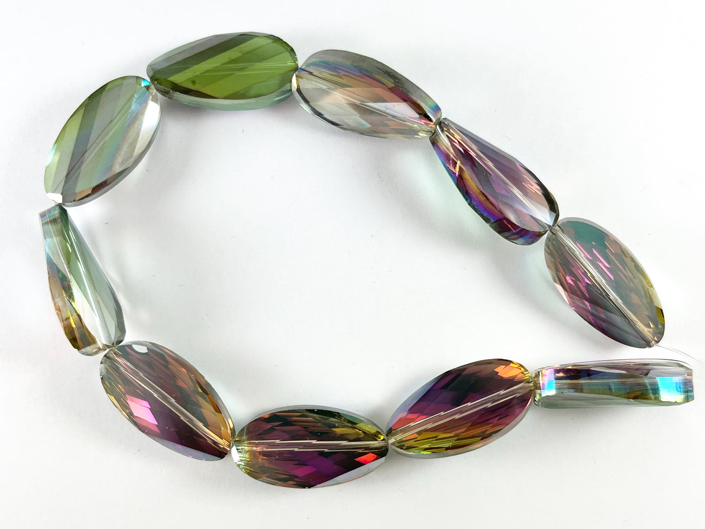 15x30mm Twisted Oval Shiny Faceted Crystal Skinny Long Oval Dyed Glass Beads 4 Colors Available Around 11"