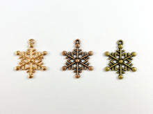 Load image into Gallery viewer, 23x25mm Pewter Christmas Snowflake Charm Xmas Holiday Winter Charm in Rosy Gold, Antique Copper and Brass | Bulk Option Available
