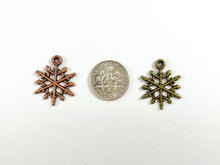 Load image into Gallery viewer, 17mm Pewter Christmas Snowflake Charm Holiday Charm in Antique Copper and Brass | Bulk Option Available
