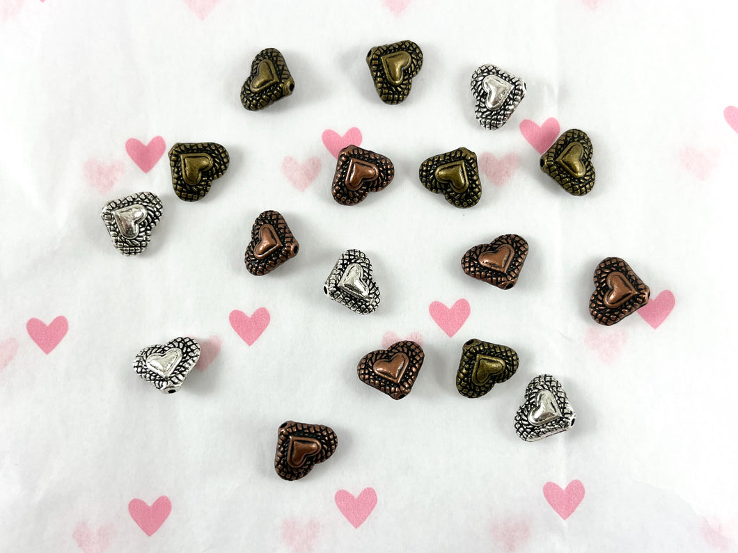 Cuentas espaciadoras de corazón de peltre, cuentas espaciadoras de corazón hinchadas de doble cara para el Día de San Valentín en color plata, cobre y bronce