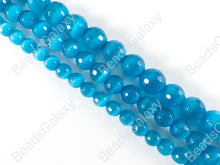 Load image into Gallery viewer, Faceted Round Cat&#39;s Eye Dyed Blue Beads Around 15&quot;
