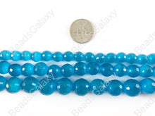 Load image into Gallery viewer, Faceted Round Cat&#39;s Eye Dyed Blue Beads Around 15&quot;
