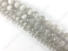 Load image into Gallery viewer, Faceted Round Cat&#39;s Eye Dyed Light Gray Beads Around 15&quot;
