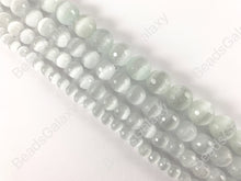 Load image into Gallery viewer, Faceted Round Cat&#39;s Eye Dyed White Beads Around 15&quot;
