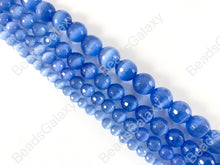 Load image into Gallery viewer, Faceted Round Cat&#39;s Eye Dyed Cornflower Blue Beads Around 15&quot;
