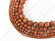 Load image into Gallery viewer, Reddish-Brown Glittering Goldstone faceted Round Beads Around 15&quot;
