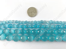 Load image into Gallery viewer, Faceted Round Cat&#39;s Eye Dyed Aqua Blue Beads Around 15&quot;
