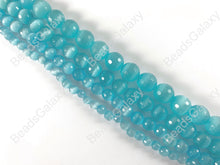 Load image into Gallery viewer, Faceted Round Cat&#39;s Eye Dyed Aqua Blue Beads Around 15&quot;
