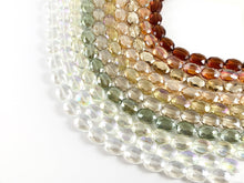 Load image into Gallery viewer, Faceted Shiny 12x16mm Dyed Glass Oval Crystal Strands
