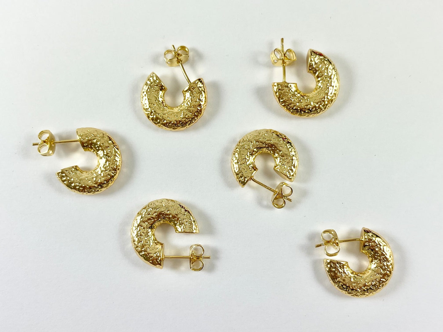 Minimalist gold earring huggies in 18k gold plated copper 5 pairs